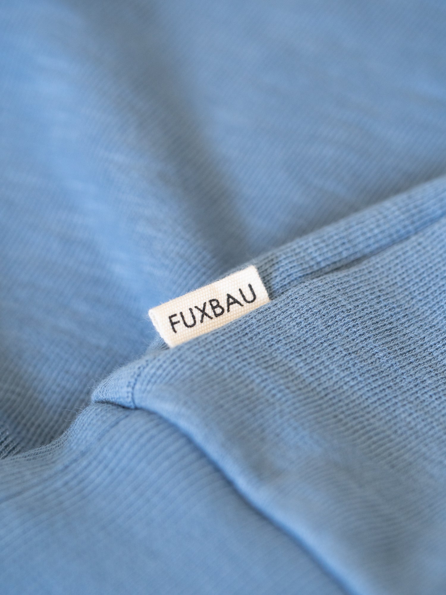 FUXBAU Sideflag vom nachhaltigen und blau melierten fux Sweater