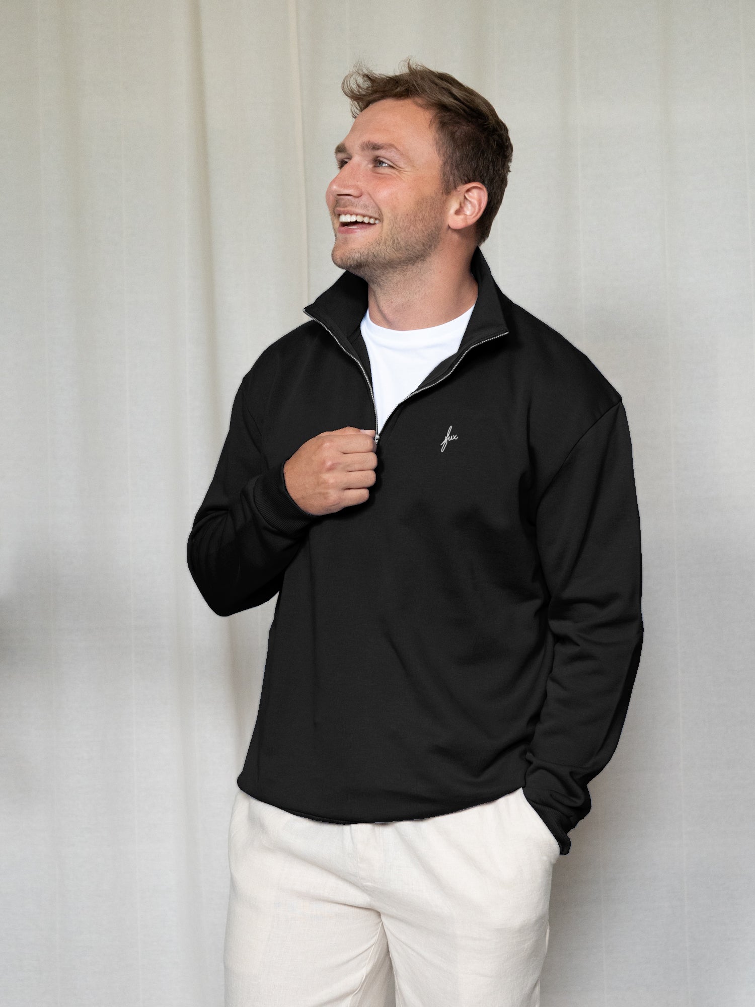 Nachhaltiger Männer Half Zip Sweater in Schwarz aus Bio-Baumwolle – fair produziert in Portugal