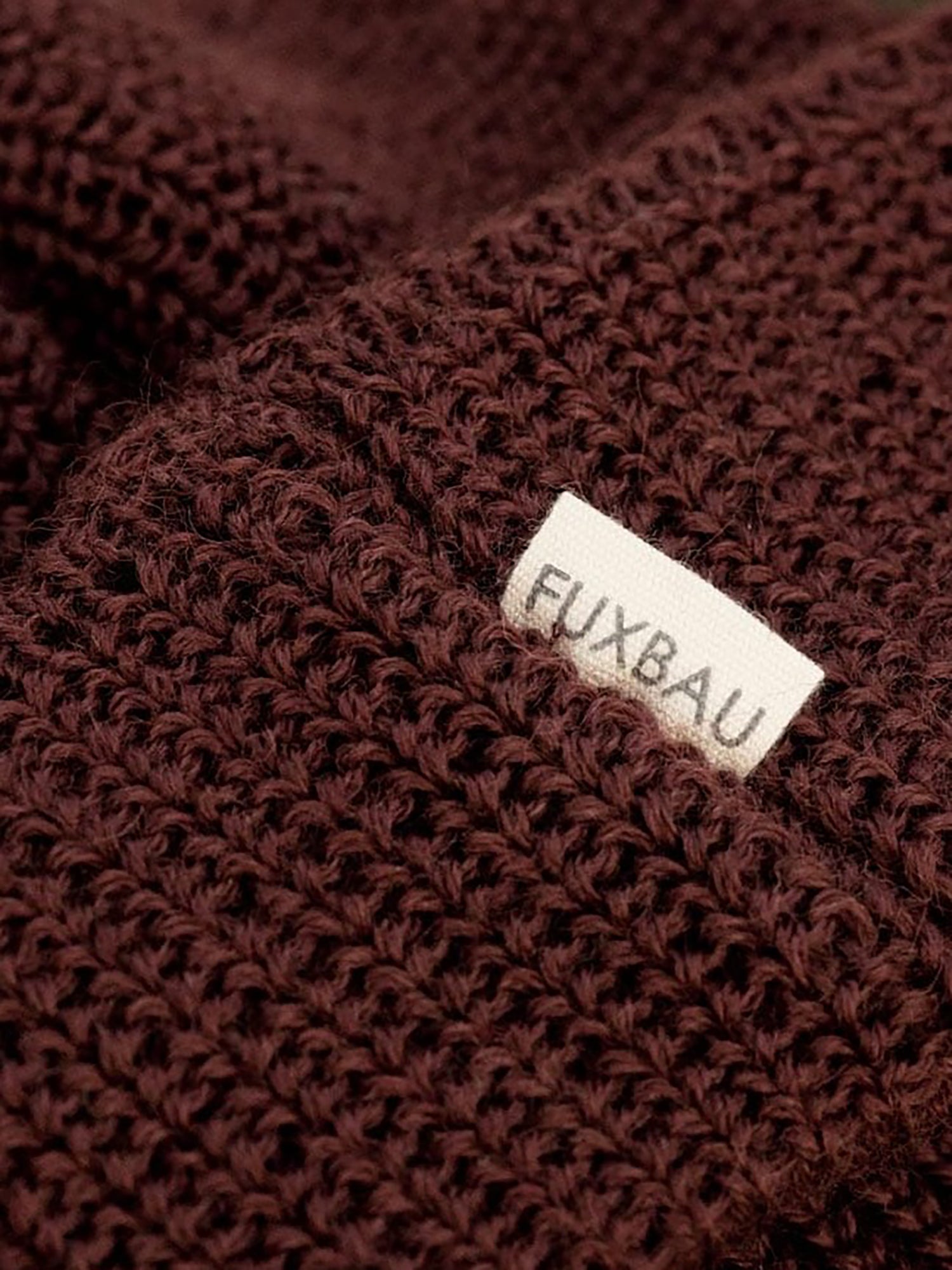 Kurze FUXBAU Merino Fischermütze in bordeaux aus 100% GOTS zertifizierter Merinowolle made in Germany